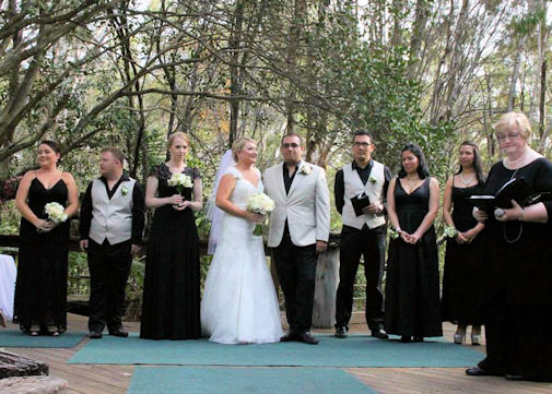 Jennifer Cram Marriage
Celebrant with wedding party - black and white
theme